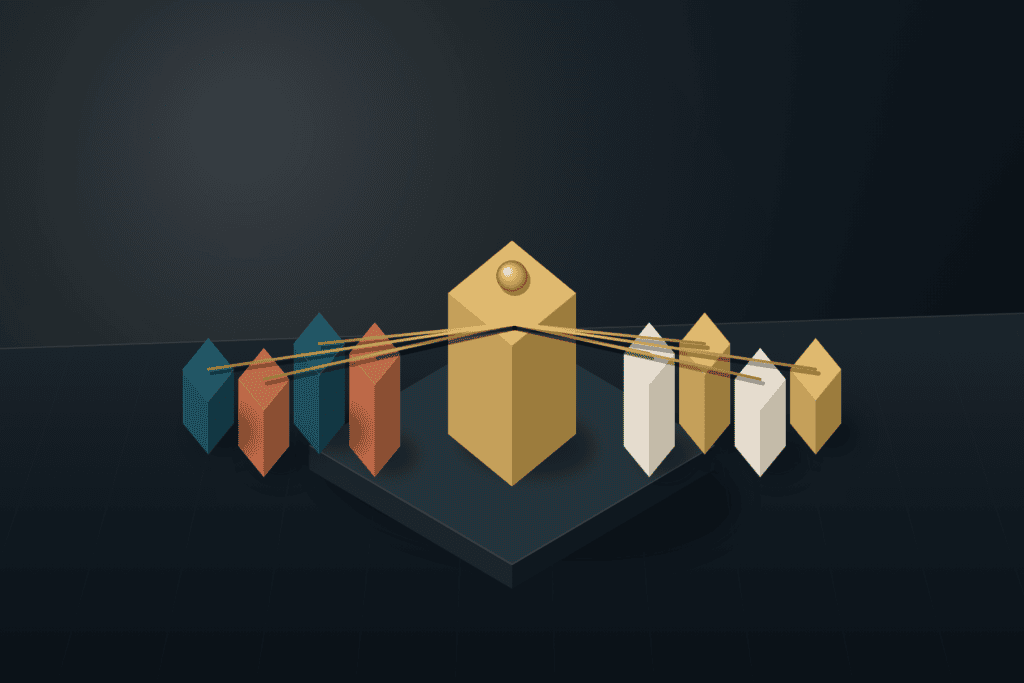 Eight architectural blocks arranged round a central brushed brass keystone on a dark slate studio workbench